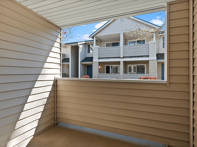 Enjoy your own private covered patio - perfect for relaxing with a morning coffee or unwinding in the fresh air. Enjoy your own private covered patio - perfect for relaxing with a morning coffee or unwinding in the fresh air.