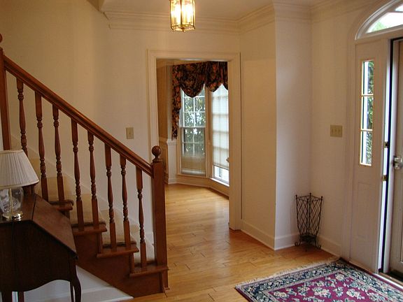 Foyer features Hardwood Floors