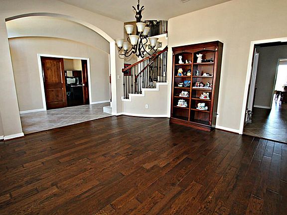 ADDITIONAL VIEW OF THE FORMAL DINING ROOM WITH BUTLER'S PANTRY LEADING TO KITCHEN