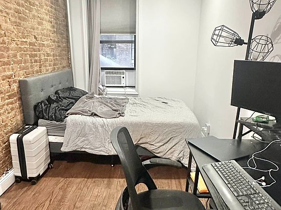 3rd image of 235 E 4th St APT 2F