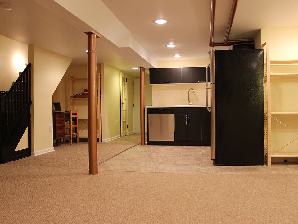 Side view of kitchen, and hallway to bedroom and bathroom.