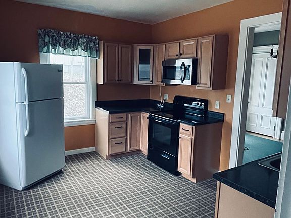 Kitchen with a view of the Dining room
