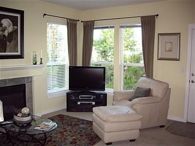 Living room with gas fireplace.