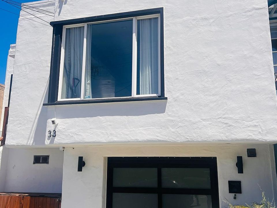 Stunning front of the house w/custom made locked up Garbage box