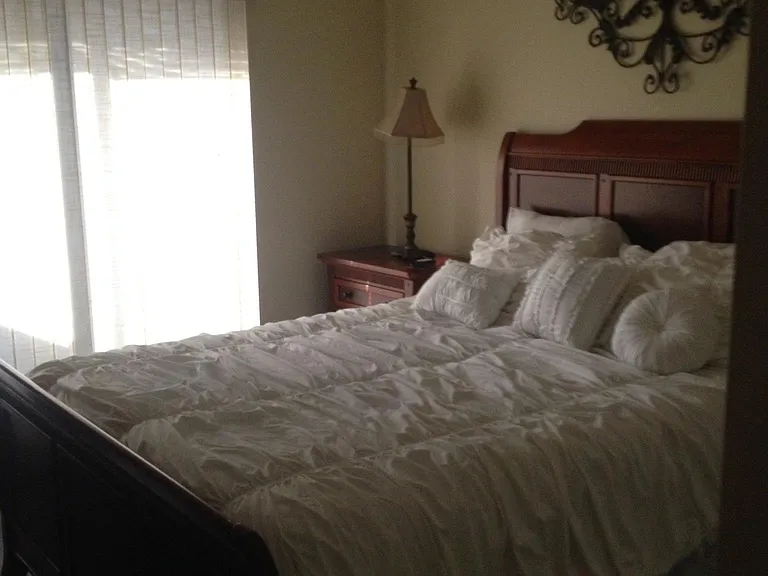 2nd Bedroom has slider to large screened patio