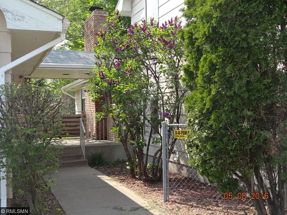 Back entry/porch with covered access to oversized garage.