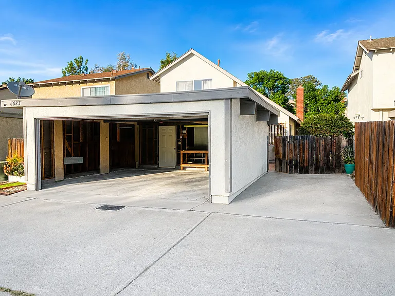 two garage and third dedicated parking space