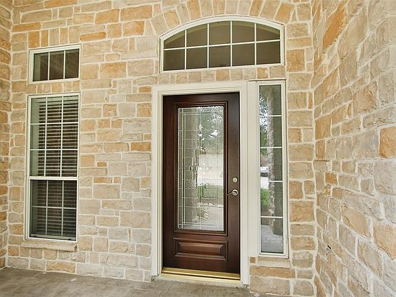 Beautiful porch and front door will welcome your guests