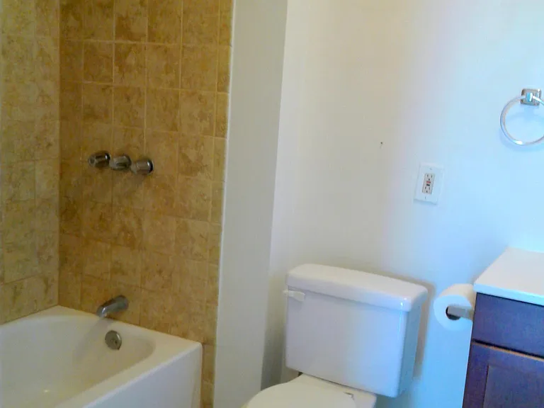 Shower over tub.