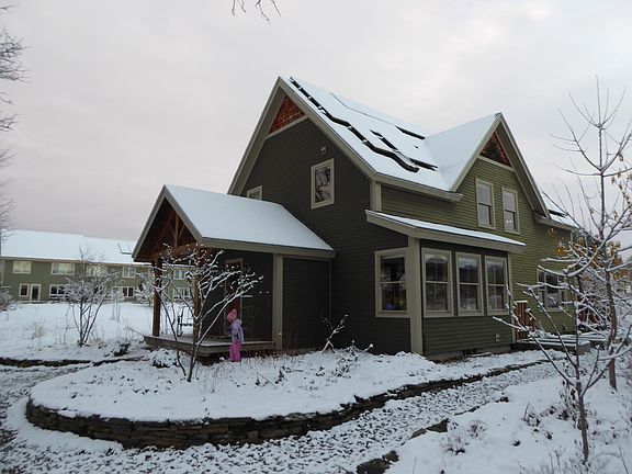 Sun room, gabled dormer and solar panels