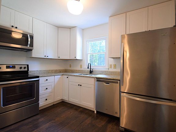 Kitchen - granite counter-tops and new shaker cabinets
