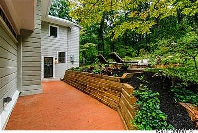 Mature hardwoods/landscaping