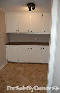 Mud/ laundry room
						:
						This mud room/ laundry area has ample storage and access to outside.