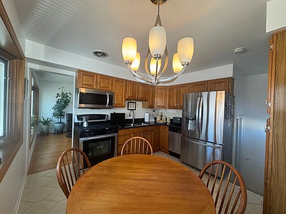 5th image of 7742 Kolmar Ave