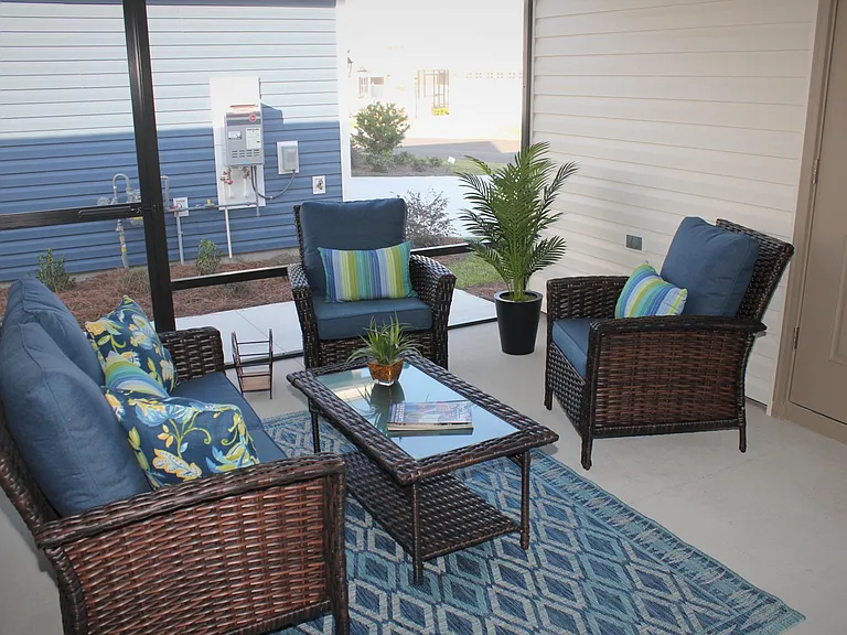 Cozy Lanai for outdoor relaxation! Separate outside patio available with table/umbrella and seating area.