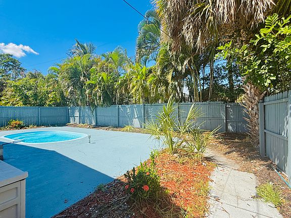 Private backyard, with an inground pool. Perfect to BBQ, take swims, and lounge out in privacy.
