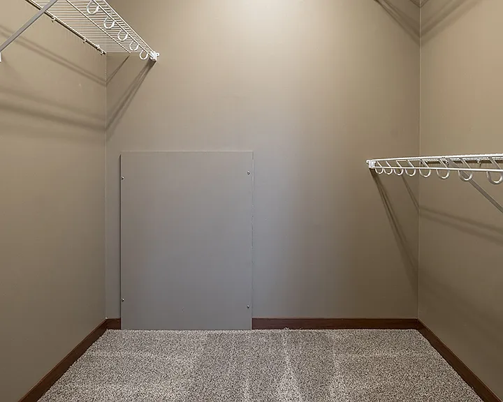 Enjoy the convenience of a walk-in closet with ample shelving and hanging space.