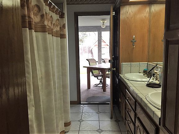 Door to patio at guest bath.