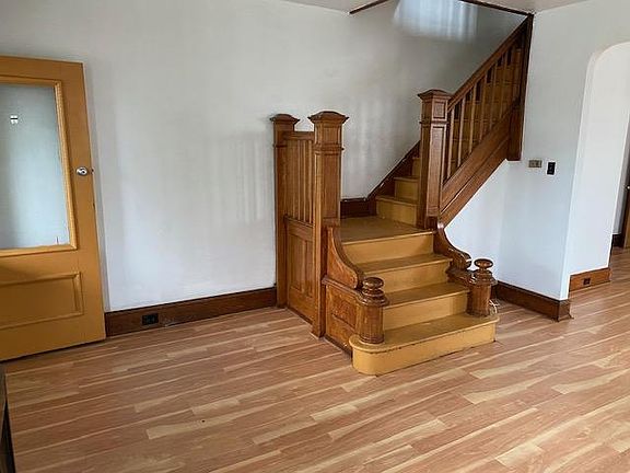 Living room and stairs to upstairs