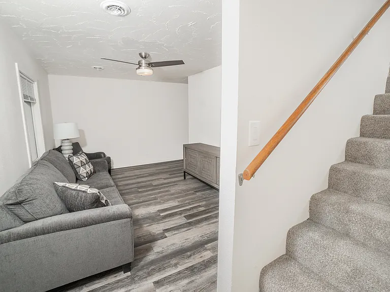 Living Area and Stairs to Second Floor