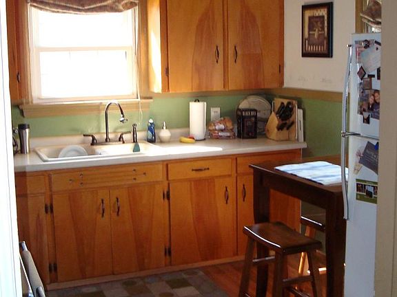 Kitchen - main level (this is an old photo_redone; dishwasher added; new counter, appliances, and paint)