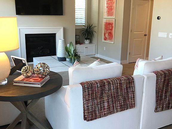 Cozy family room with gas fireplace and Samsung flat screen TV included.