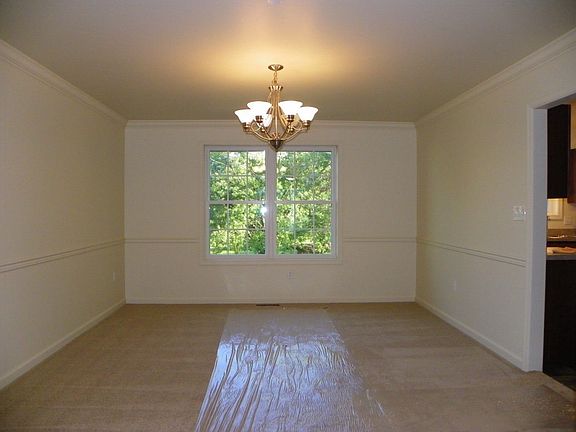 Dining Room with Crown Molding & Chair Rail