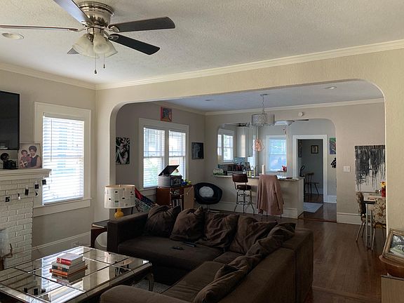 Living Room looking into Dining and Kitchen
