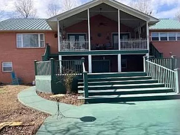 Back view of home...screened in patio on upper level
