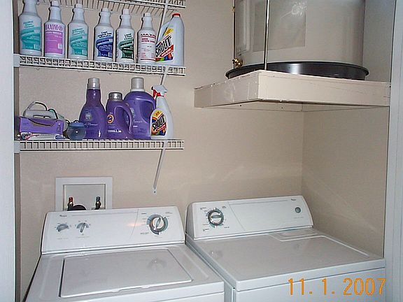 Separate laundry room off the kitchen