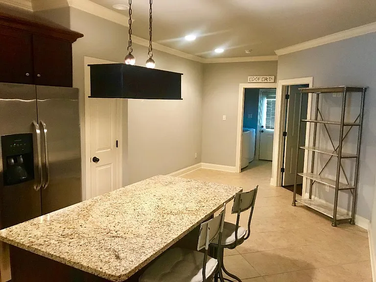 Large kitchen with additional space for a dining area.
