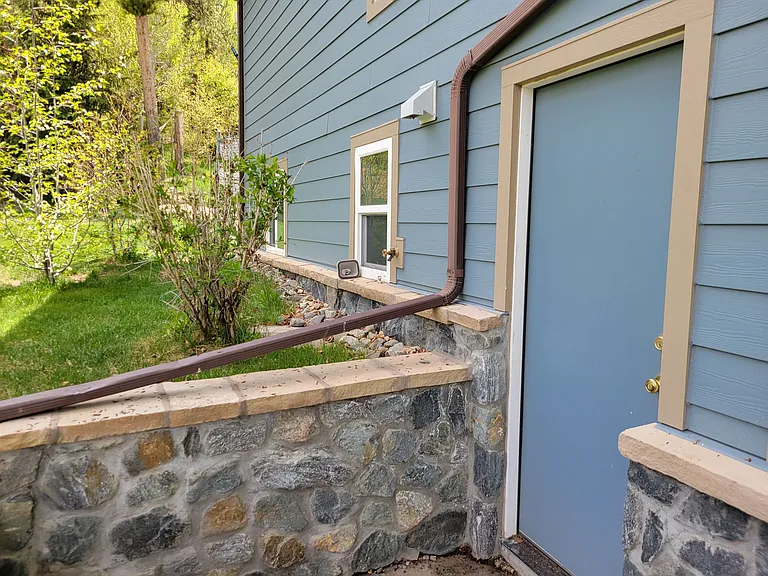 Downstairs entrance into laundry/gear room.