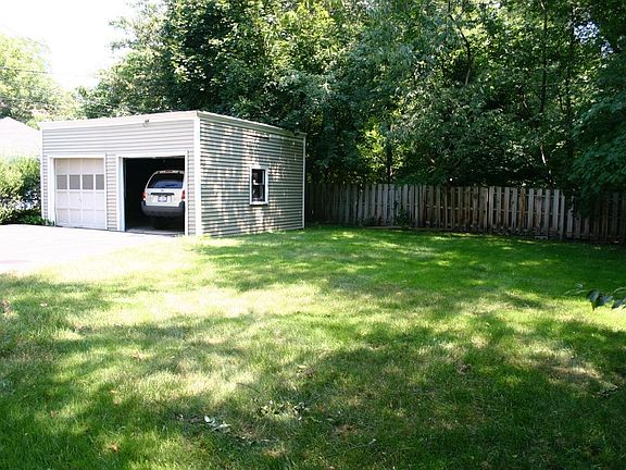 Back yard, garage and parking area