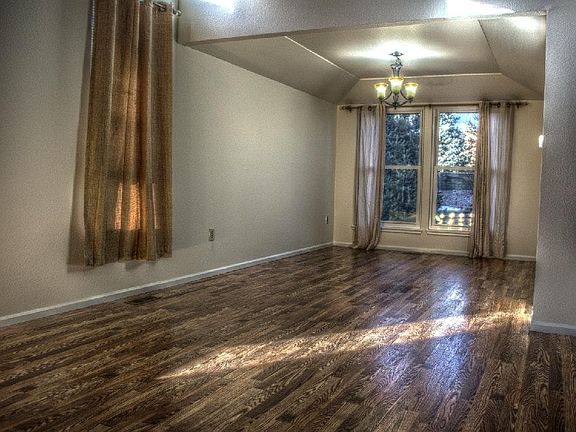 Light and Bright Dining Room with views of beautiful back ya