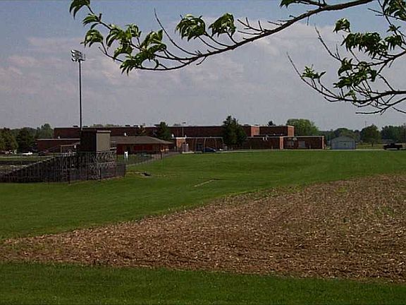 Exterior Front. View of the school from the  Backyard.