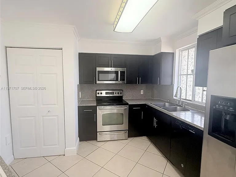 6155 NW 186th St #308 — Photo 3