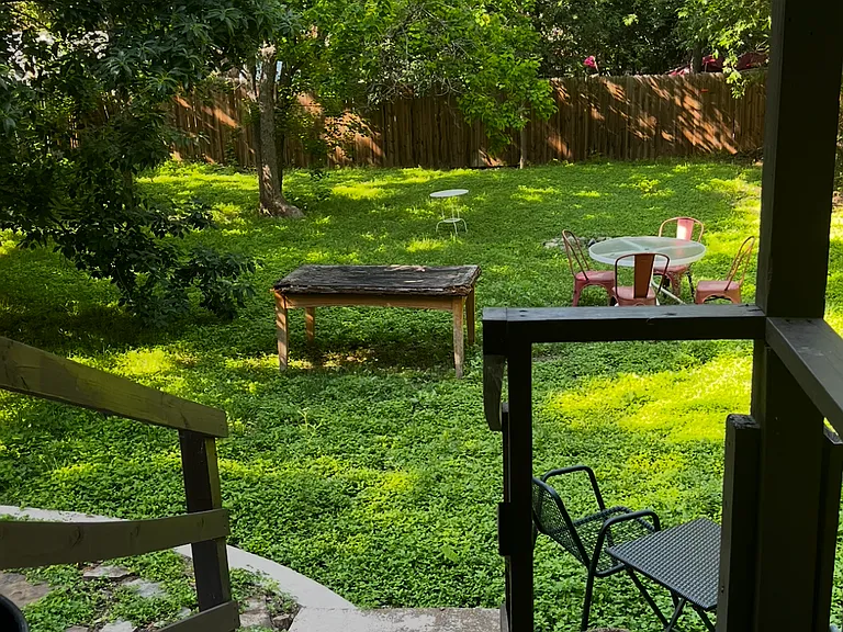 Large shared backyard. Landlord maintains yard