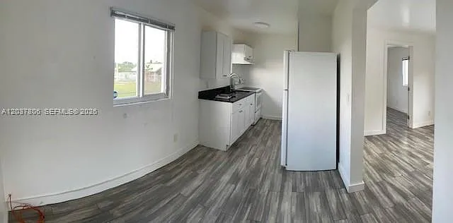 337 NW 59th Ter #A — Photo 3