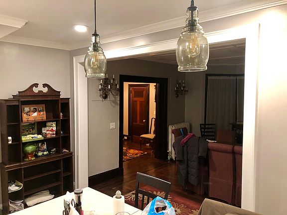 Biew from kitchen to dining room to entry and the mudroom door.