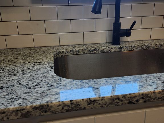 Large sink with pull down faucet