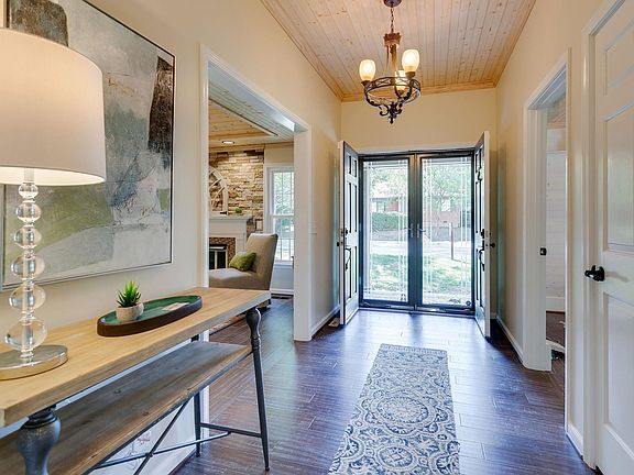 Enter thru double front doors onto hardwoods, new sheetrock and new paint throughout - shows beautifully