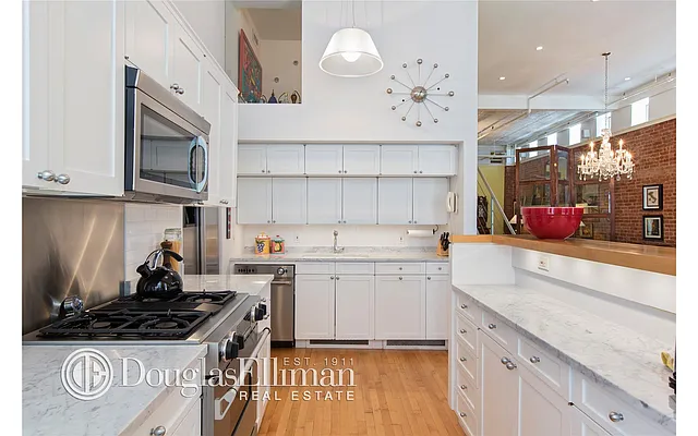 Sold by Douglas Elliman | media 10