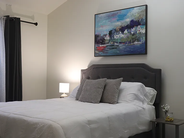 Master bedroom with vaulted ceiling bath with oversize tub.