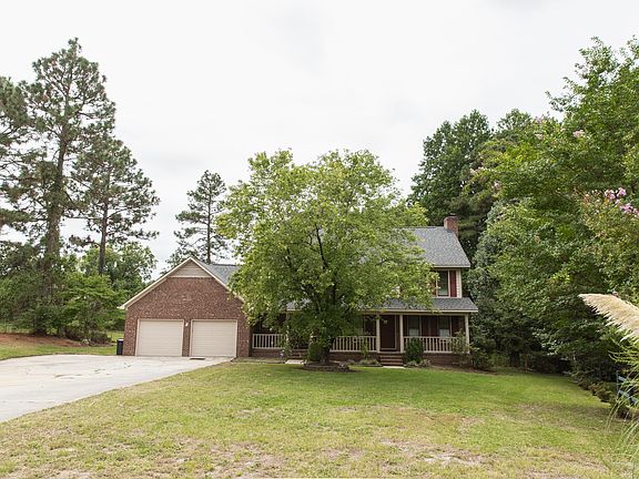 Partially wooded backyard