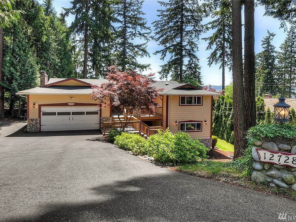 Beautifully maintained Edgewood home set amidst the evergreens with a picturesque backdrop off the foothills.
