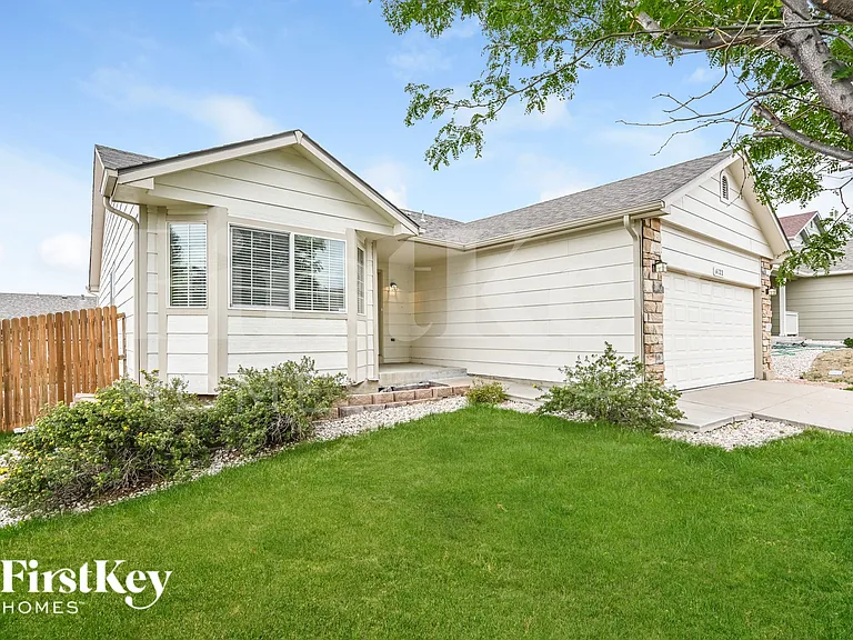 6122 S Quemoy Ct — Photo 2