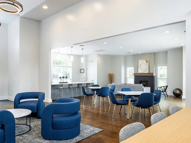 Resident lounge with kitchenette and coworking spaces