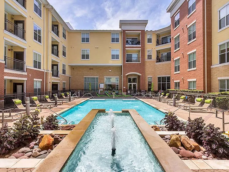 Residents enjoy two resort-style swimming pools with sun shelves