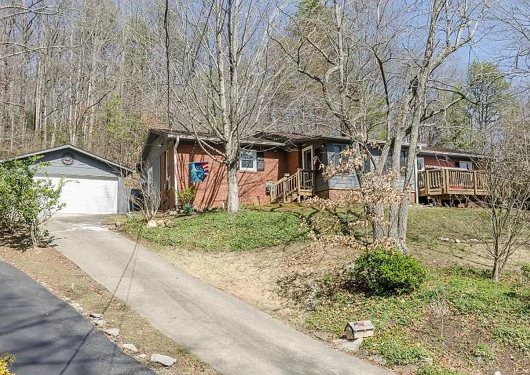 We call it up in the trees! Yes, a 2 car detached garage