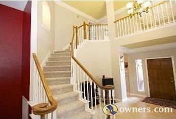 2 storey foyer, travertine tile, new carpet